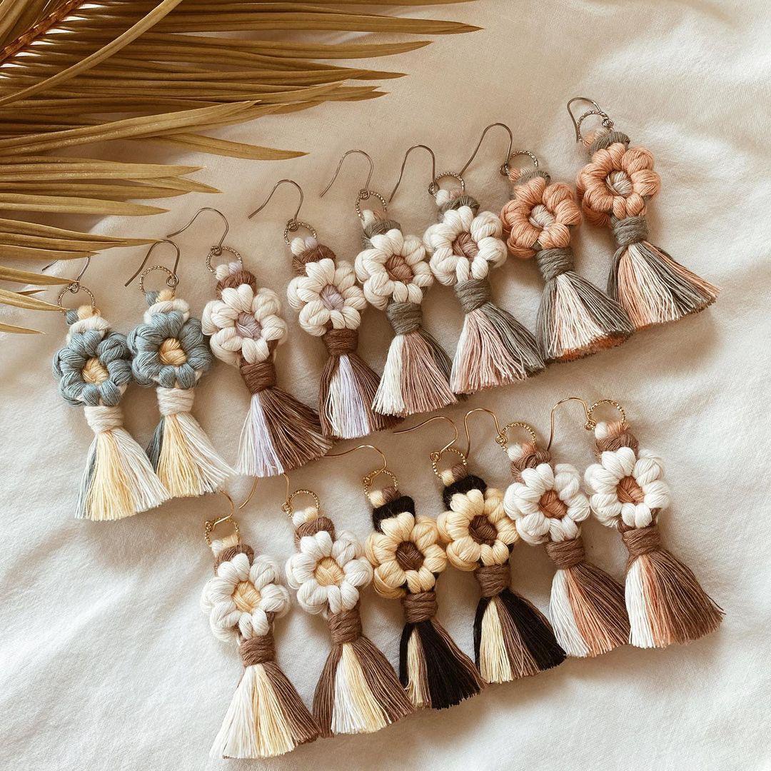 Macramé flower-knot tassel earrings in neutral tones