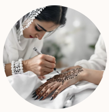 Skilled henna artist applying intricate mehendi